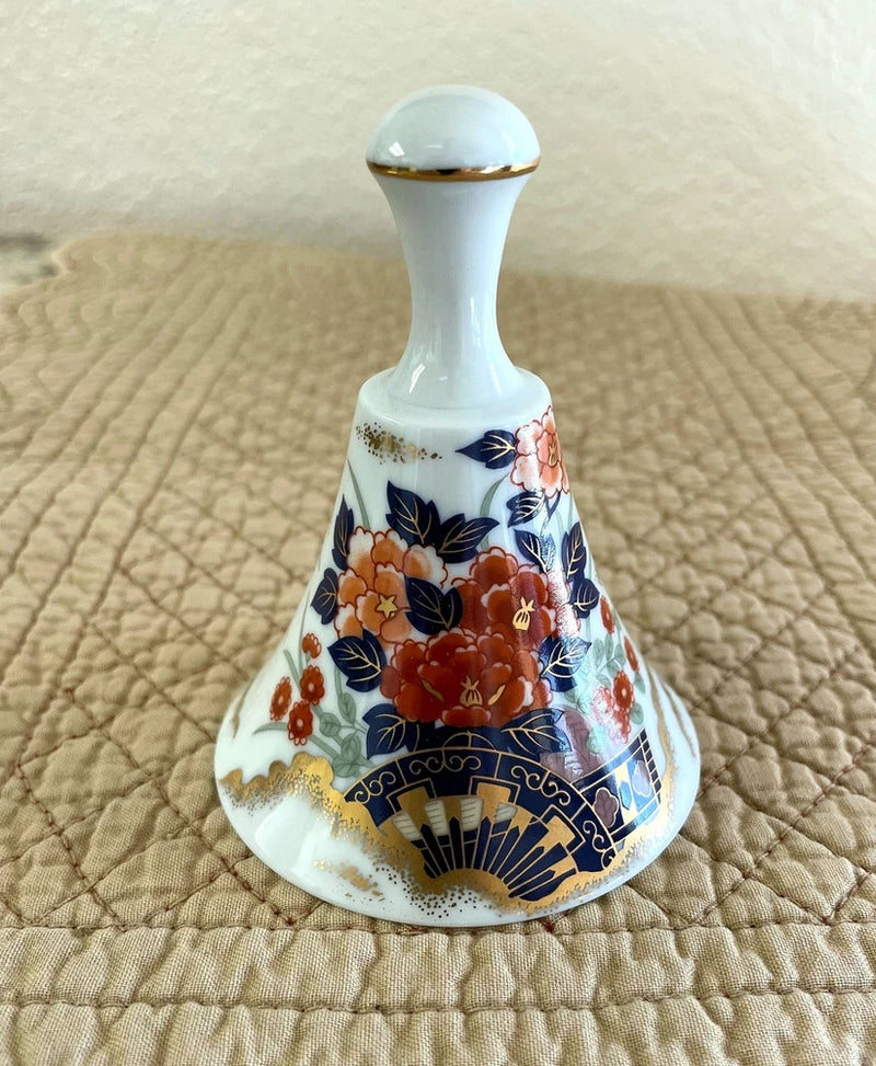 Vintage porcelain peony flower cart with blue fan and orange floral pattern