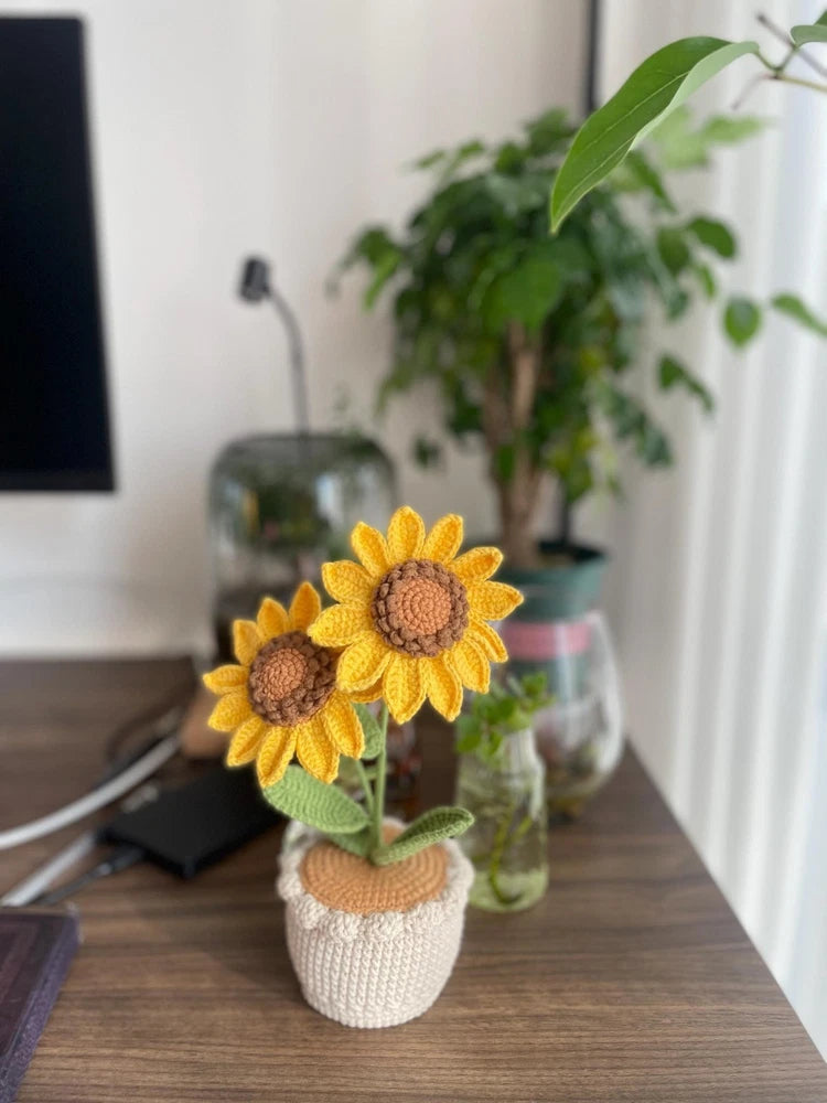 Handmade crochet mini flower pot decor with two yellow sunflowers, brown centers, green leaves