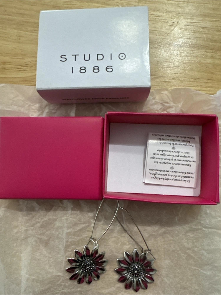 Sunflower drop earrings, silver-tone with red and dark center gems
