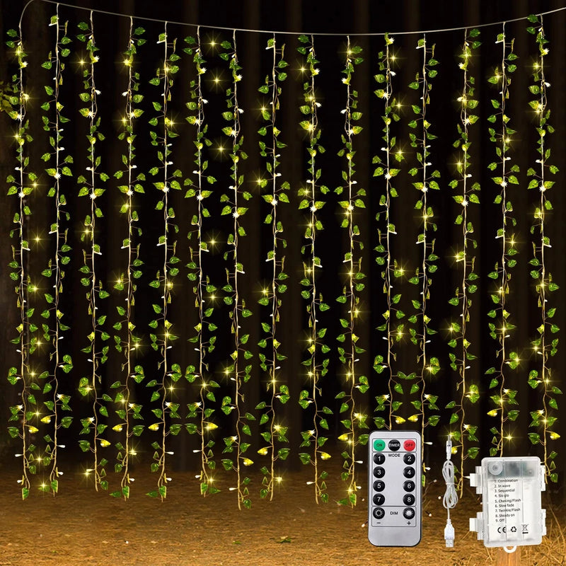 Green fake ivy vine string light curtain with warm bulbs, plus remote and power adapter.