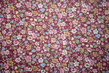 SMALL PINK, YELLOW AND BLUE FLOWERS ON MAROON FROM WAMSUTTA -100%  COTTON FABRIC Flowering Plants
