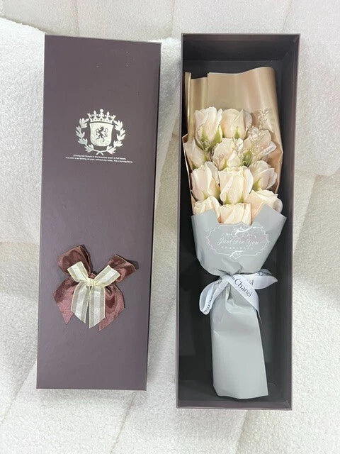 Rose flower gift box with preserved soap roses in a wrapped bouquet