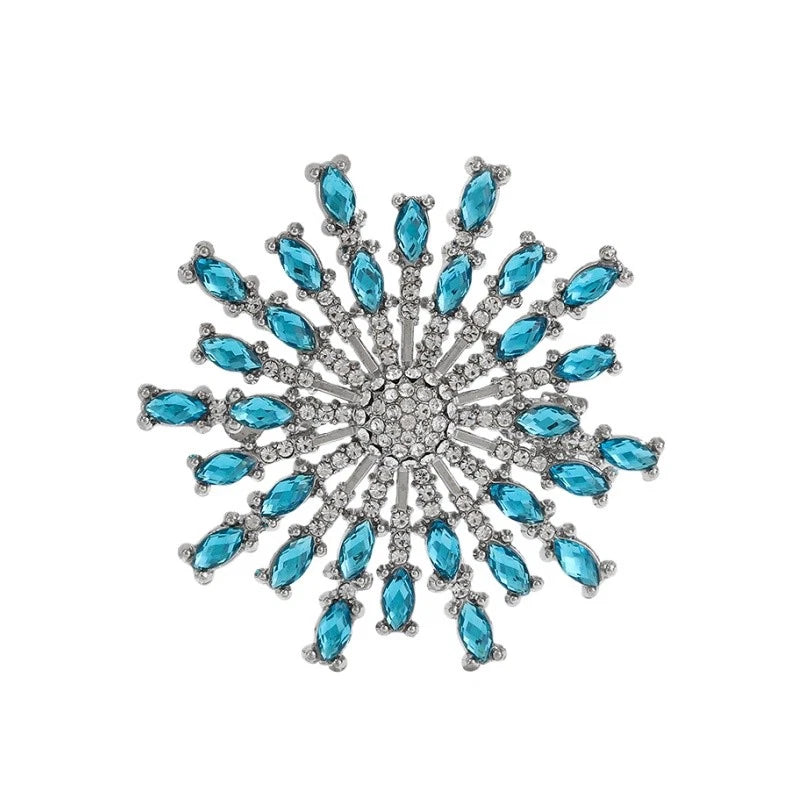 Teal crystal sunflower rhinestone brooch pin with silver-toned metal spokes