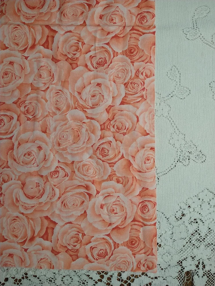 Cotton quilt fabric remnant with packed pink rose floral print