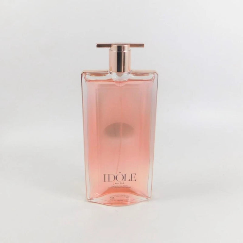 Idole AURA by Lancome EDP perfume bottle, clear pink glass with rose-gold sprayer
