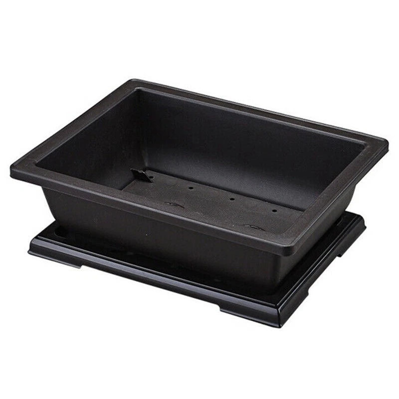 Black plastic square planter basin with drainage holes and base tray