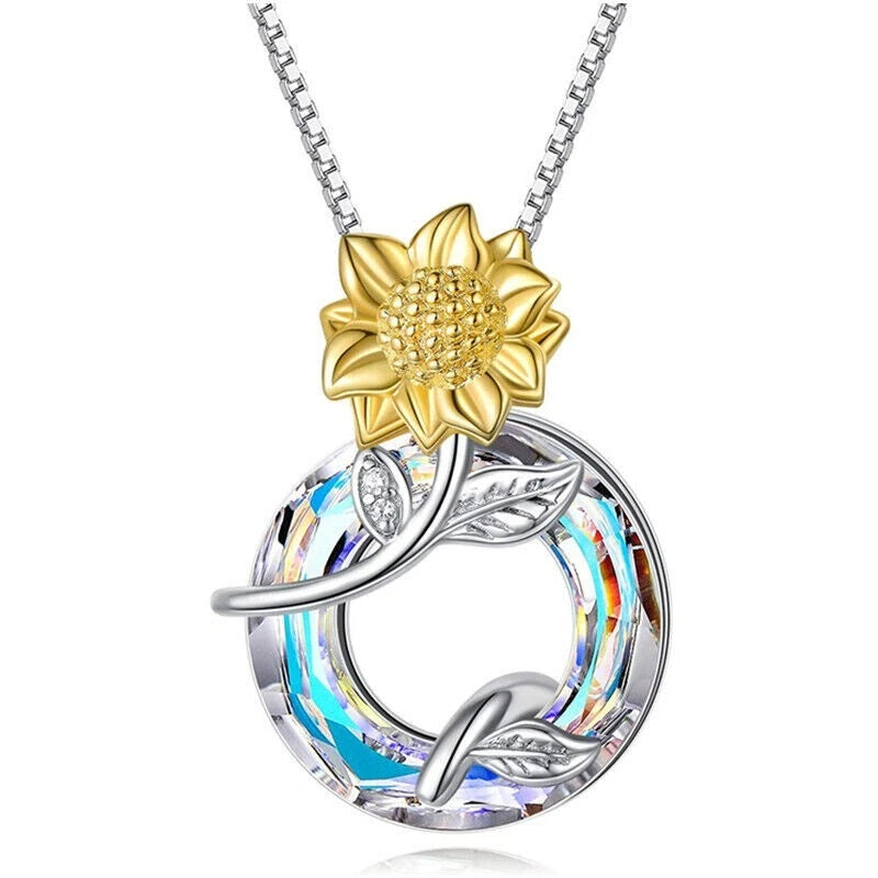 Silver sunflower pendant necklace with iridescent rhinestone locket and gold flower cap