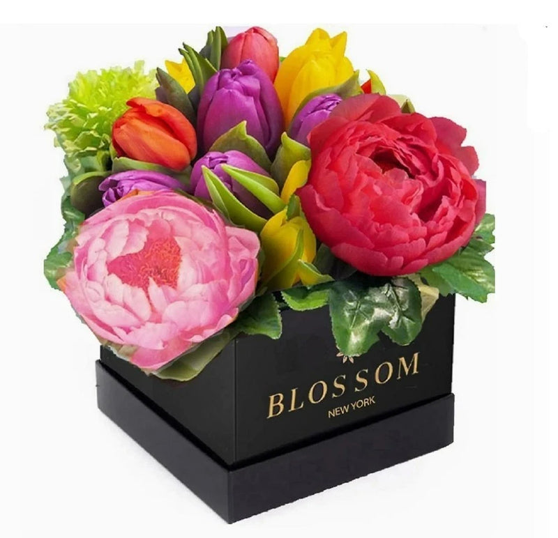 Black gift box of preserved rose soap flowers with pink, red, purple blooms, 'BLOSSOM' lid