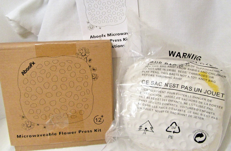 Microwavable flower press kit box with flower diagram and 12+ age label