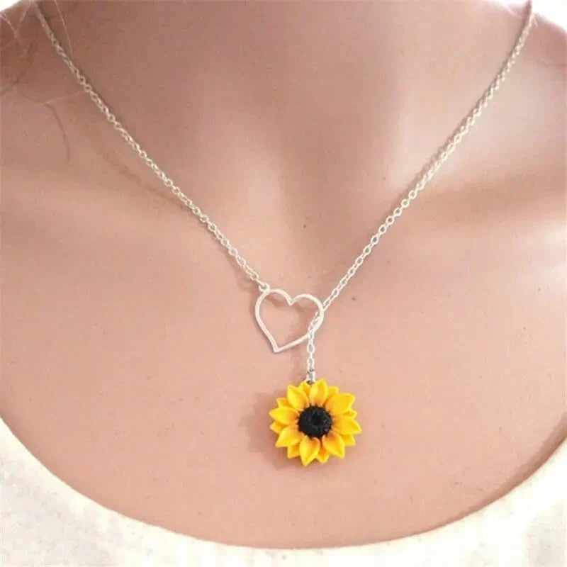 Silver heart lariat necklace with yellow sunflower charm