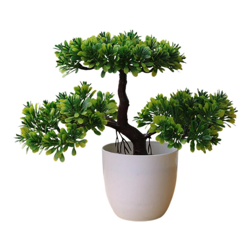 Artificial bonsai tree with bright green leaves in a white round pot