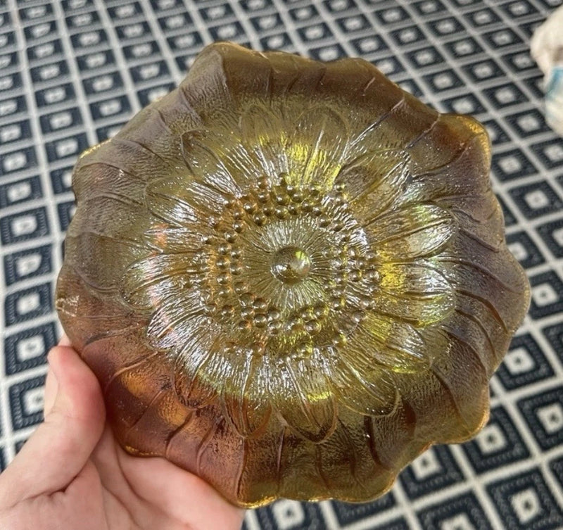 Amber iridescent carnival glass round sunflower bowl with raised petal flower pattern
