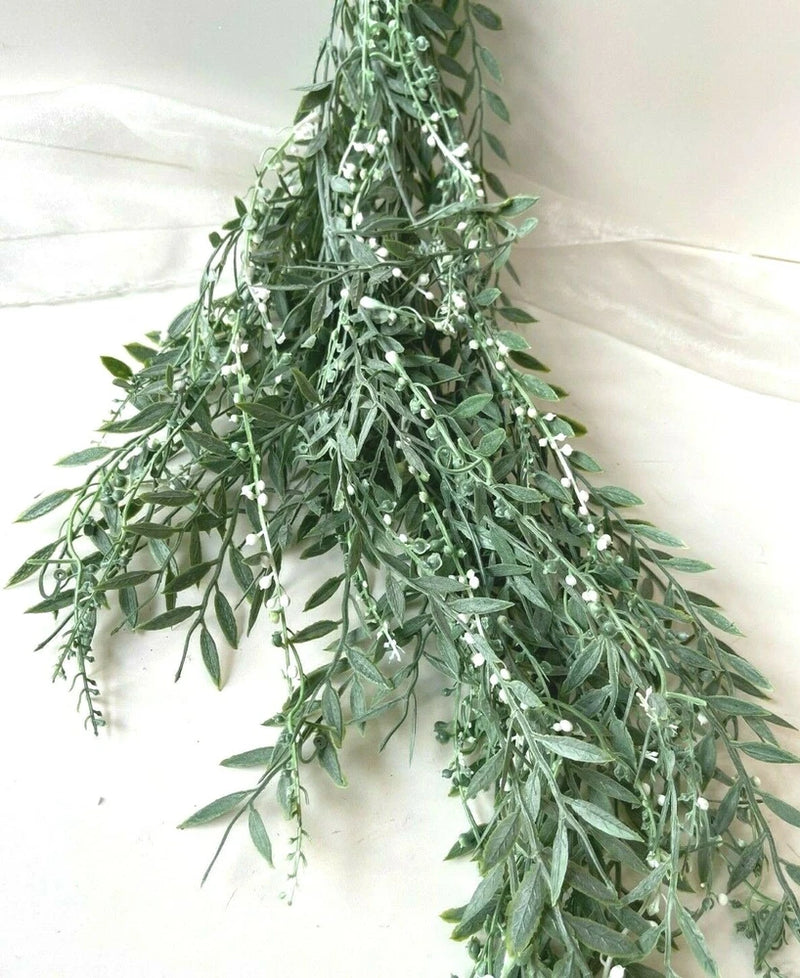 Artificial hanging plant garland with dusty green narrow leaves and trailing sprigs