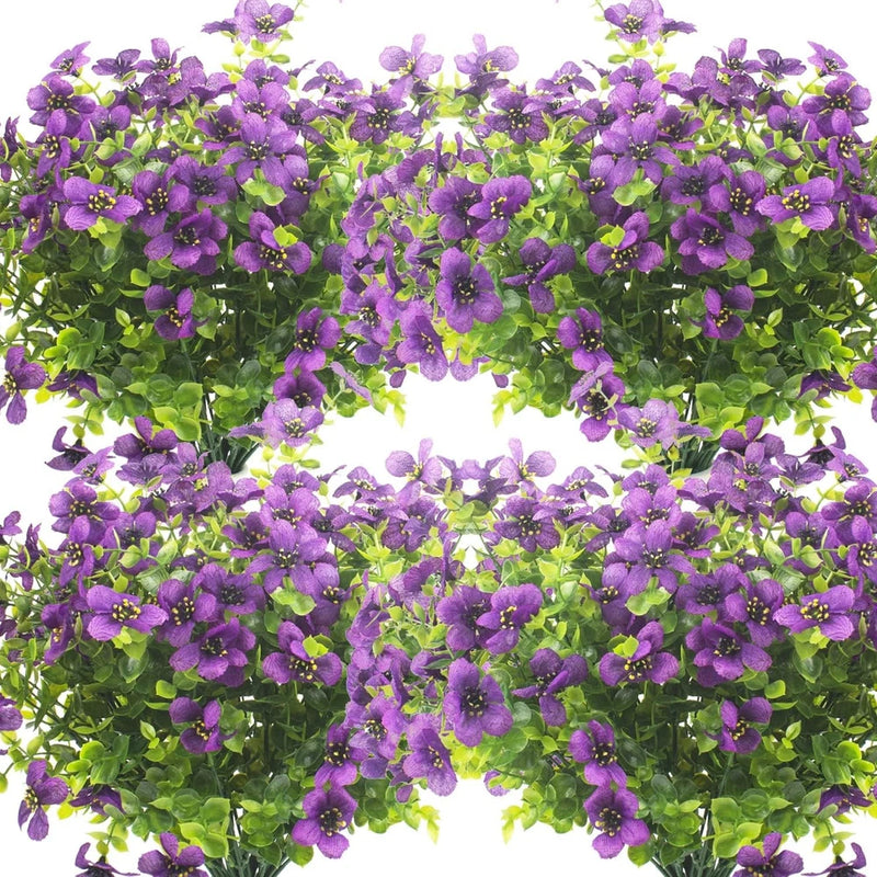 Artificial faux eucalyptus flower shrub with purple blossoms and green leaves