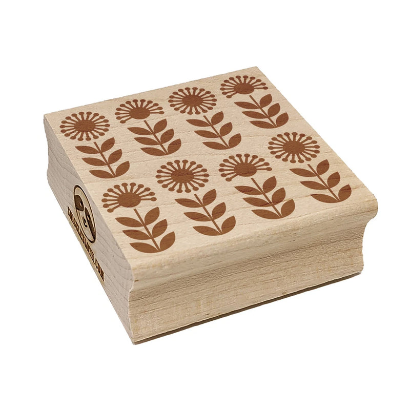 Square sunflower rubber stamp on light wood block, brown floral pattern on top