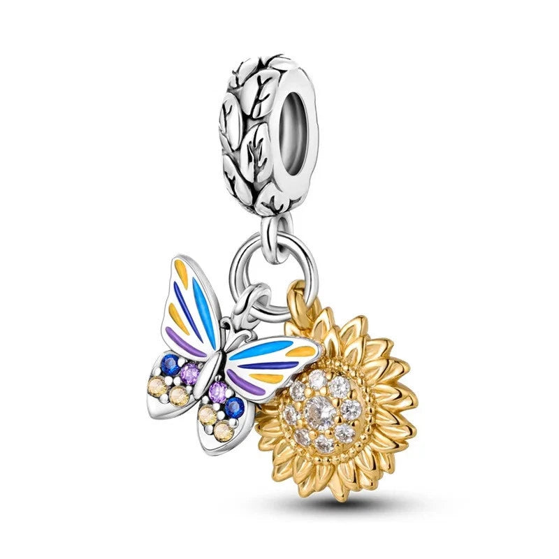 925 sterling silver charm with enamel butterfly and gold-tone sunflower, crystal accents