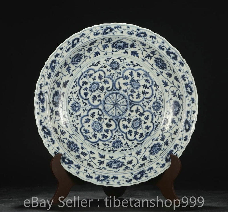 Blue and white porcelain decorative plate with dragon and peony motif