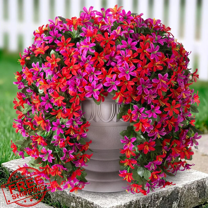 Artificial lily flower hanging basket with dense pink and red blooms in gray pot