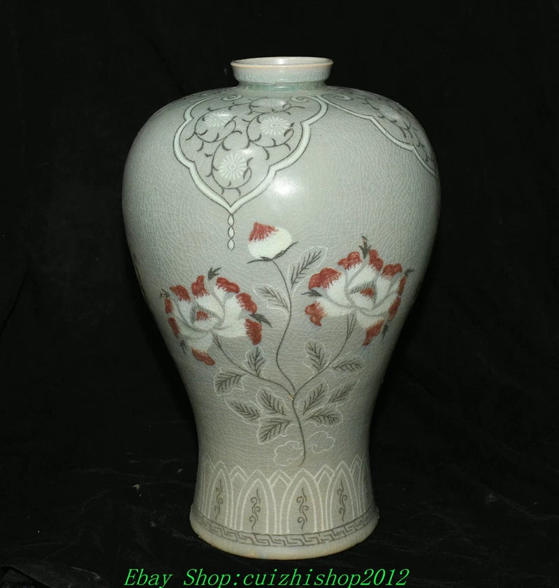 Korean porcelain peony vase, light celadon green with raised relief and red flower design
