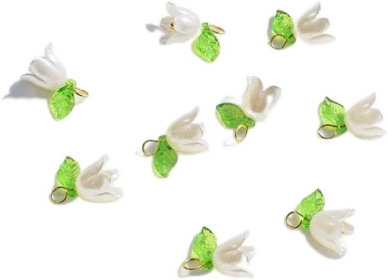 Resin flower pendant charms: white lilies with green leaves and gold-tone rings