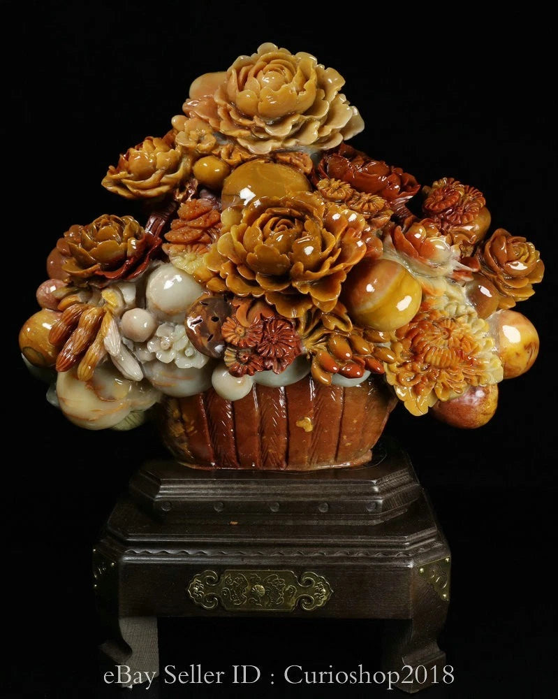 Carved Shoushan stone peony bouquet sculpture in dark wooden base