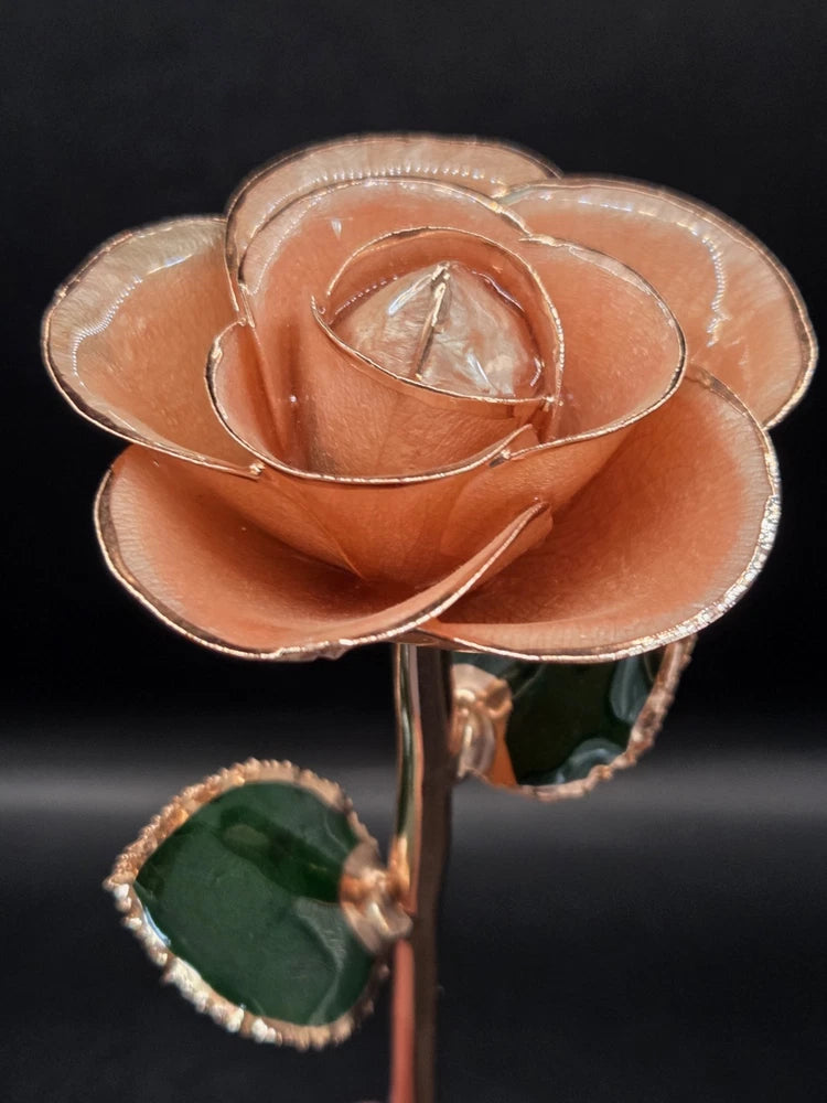 Gold-dipped preserved rose with layered petals, rose-gold tone and dark stem