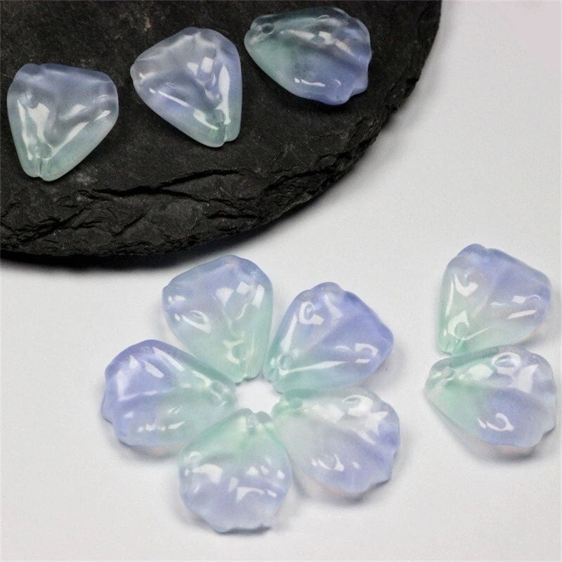 Lampwork glass flower petal beads, light blue with pale green accents, set of several