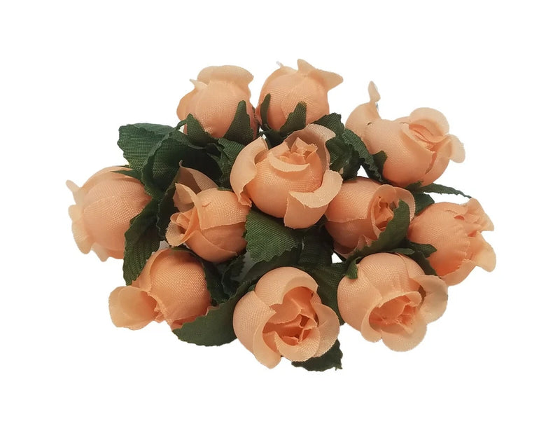 Peach artificial rosebuds with green leaves for millinery and crafts