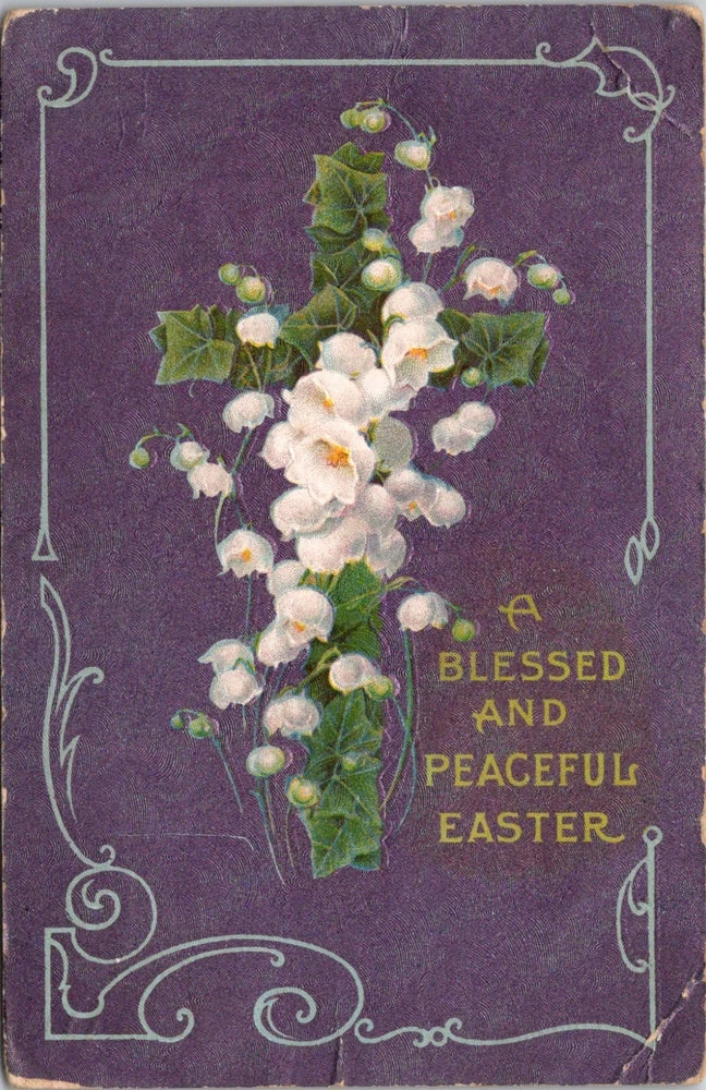 Purple Easter postcard with lily of the valley vine and text "BLESSED AND PEACEFUL EASTER"
