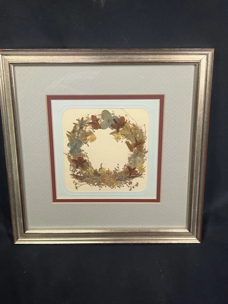 Vintage framed dried flower wreath artwork with circular floral arrangement