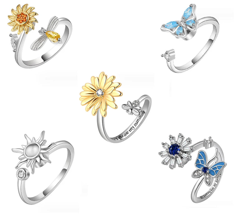 Silver-tone CZ fidget spinner ring with sunflower, bee, and butterfly designs