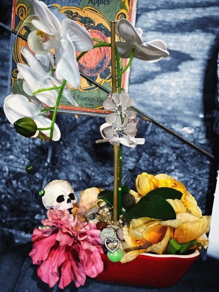 Handmade gothic sculpture fuses floral elegance with macabre charm Ranunculus