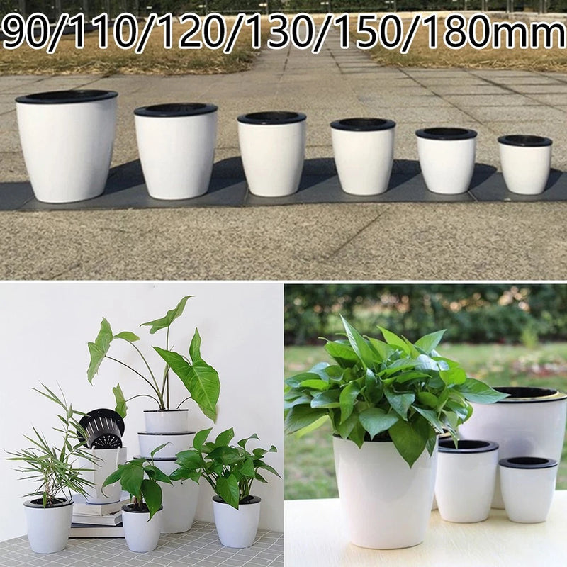 Set of white self-watering plastic flower pots in multiple sizes, including planter tops.
