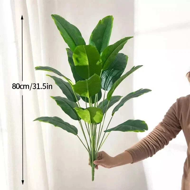 Artificial banana plant with multiple green leaves on flexible stems