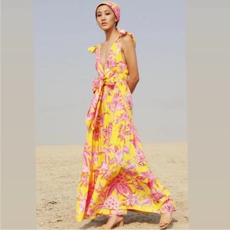 Yellow floral cotton maxi dress with pink accents, sleeveless, tied waist