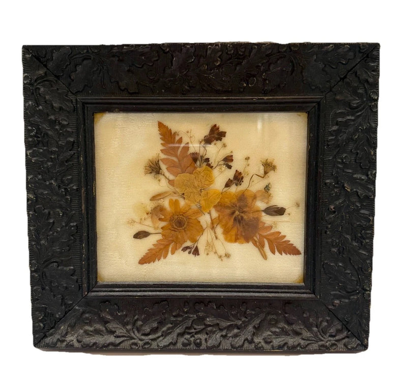 Black ornate frame pressed dried flowers wall art with botanical bouquet