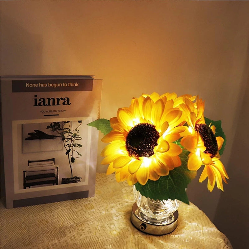 Artificial LED sunflower table lamp with two yellow blooms in clear glass vase base