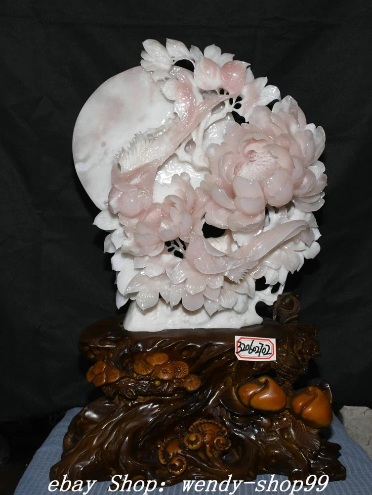 Pink and white peony moon statue with carved bird on dark brown base