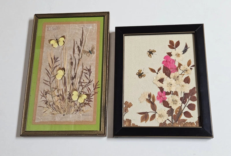 Pair of framed pressed-dried flower artworks with butterflies and botanical blooms