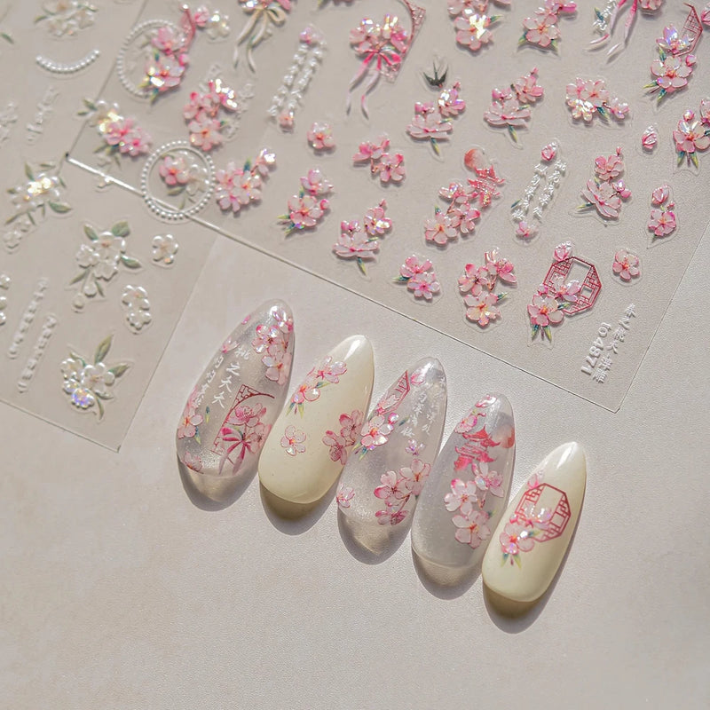 Floral 3D nail stickers with pink blossoms and gold accents for nail art