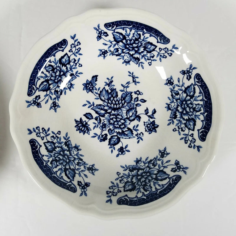 Ironstone ceramic bowl with blue floral pattern, round rim