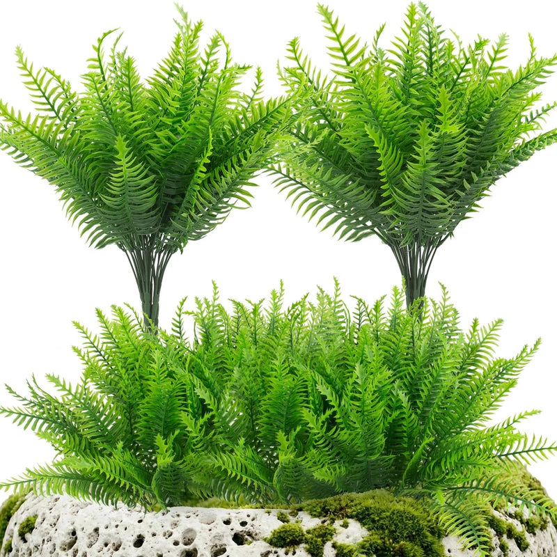 Faux fern plant set with bright green fronds and dark stems