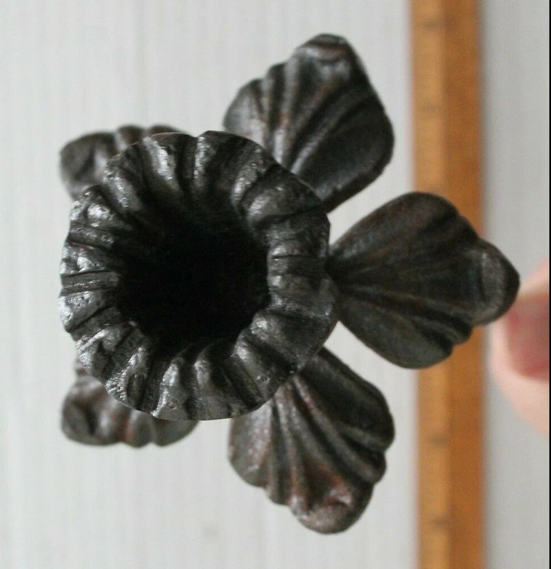 Rustic cast iron flower garden stake with daffodil-style metal bloom, dark finish