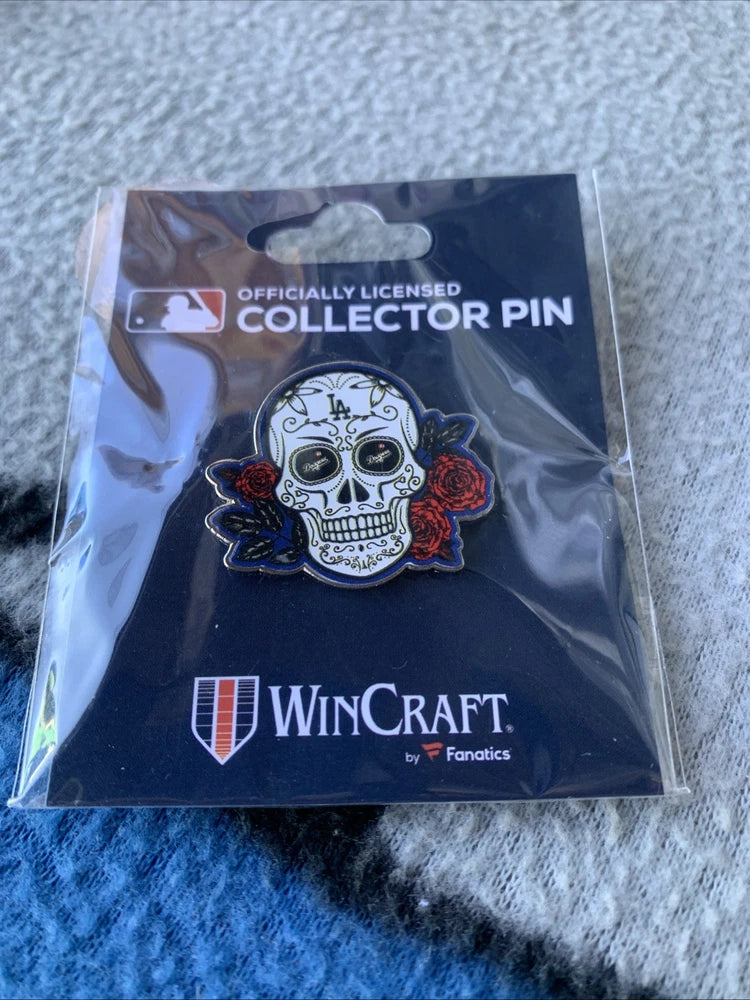 Los Angeles Dodgers collector pin on card, sugar skull with roses and blue outline