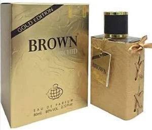 Gold edition eau de parfum bottle and box, brown glass with ornate label