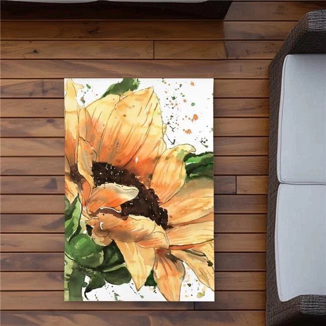 Sunflower area rug with orange petals and green leaves, brown center on light background