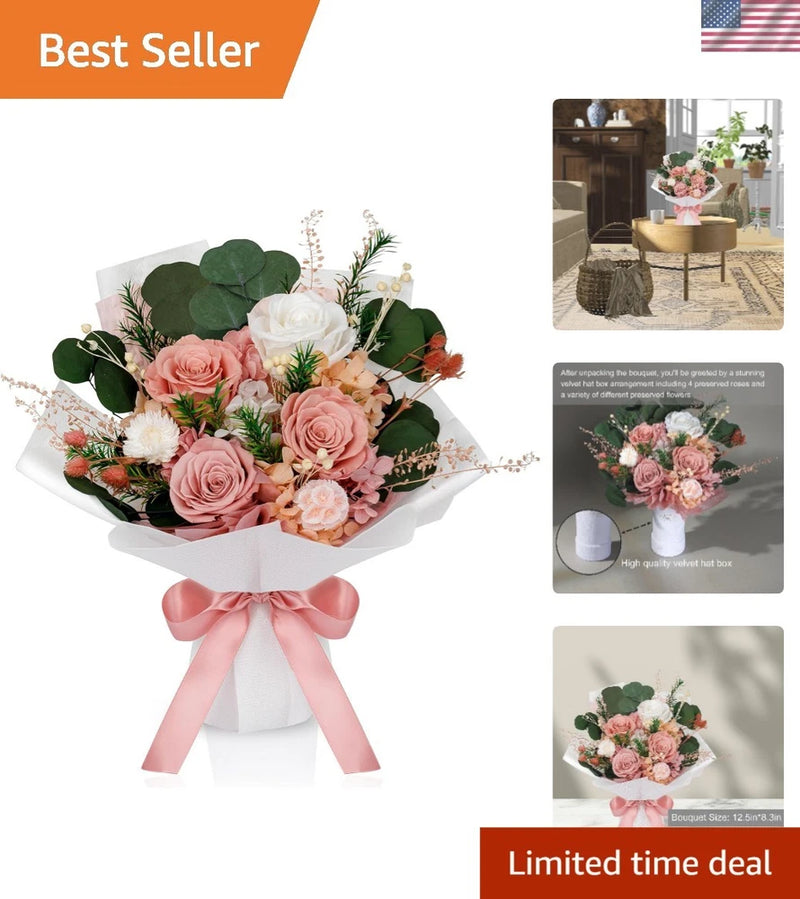Preserved flower bouquet with pink roses and greenery, wrapped in white and tied with pink ribbon