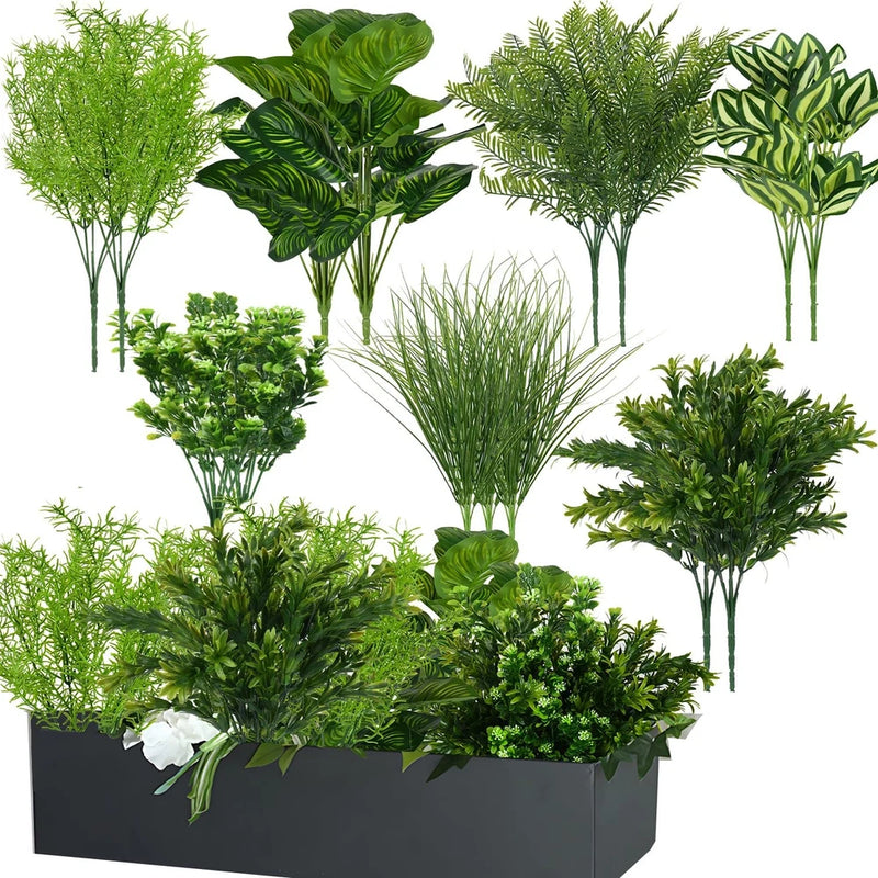 Set of artificial green plant stems with foliage in a rectangular planter