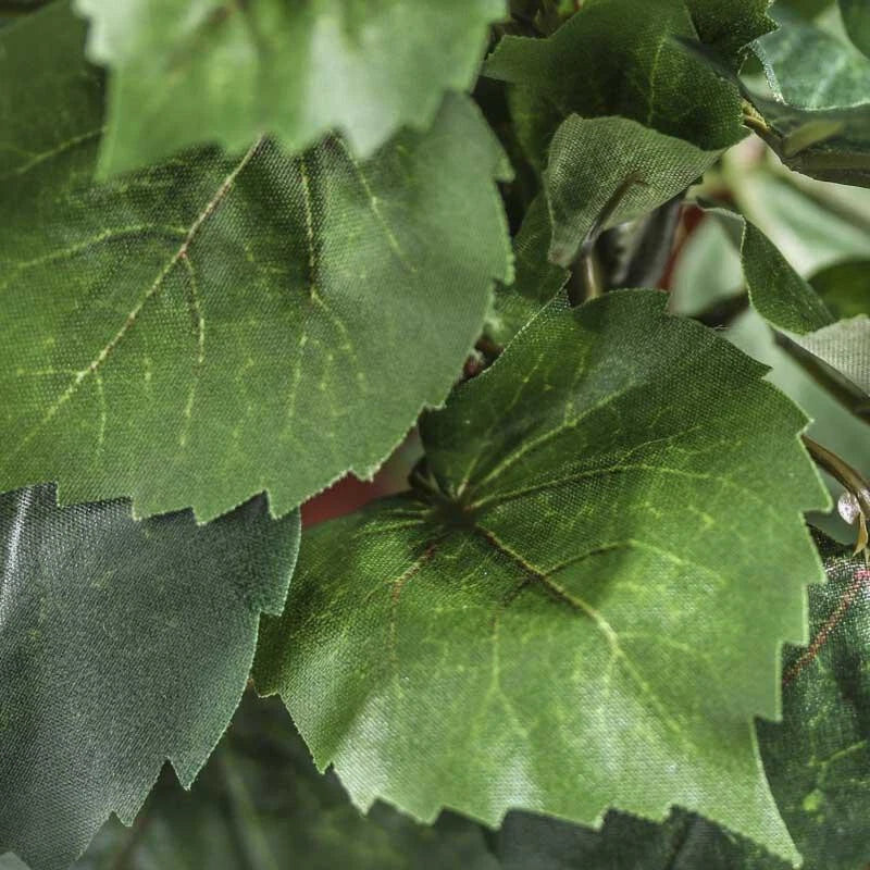 Artificial green leaf sprays, close-up of clustered leaves with stitched veining