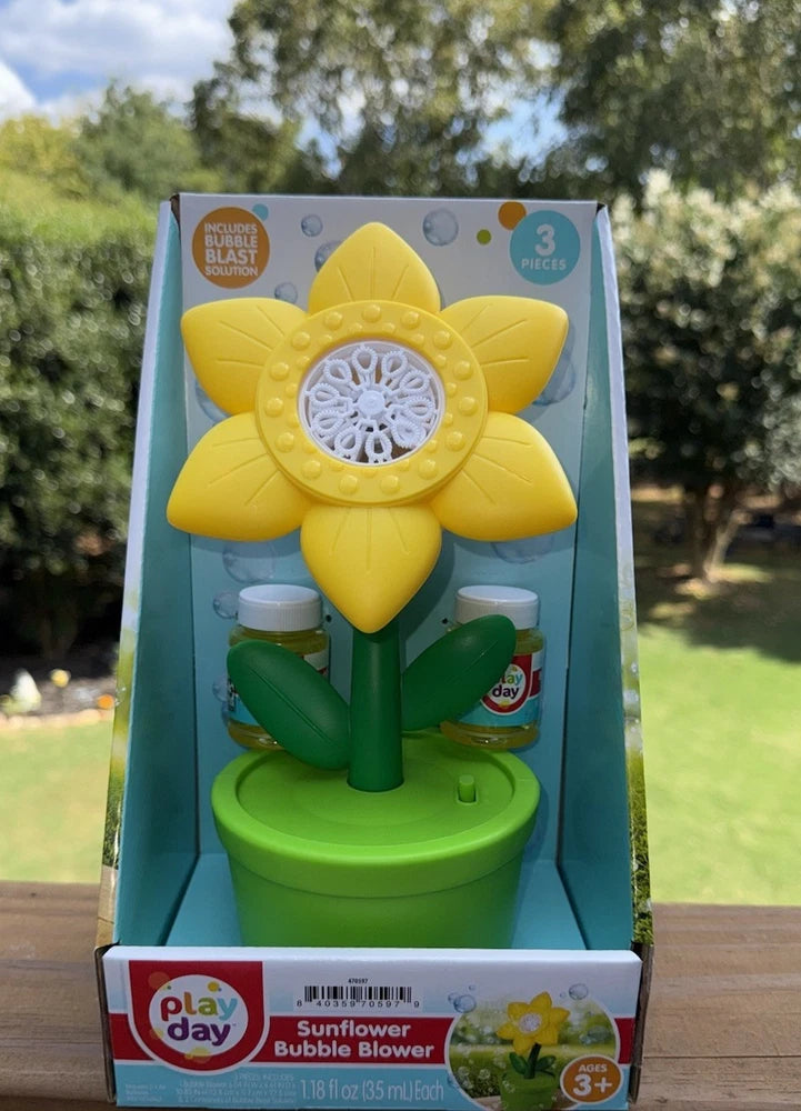Sunflower bubble blower toy with green base and yellow flower in retail box